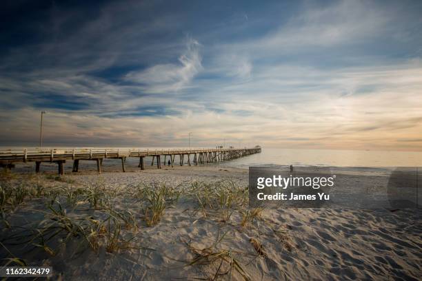grange beach jetty - bay adelaide stock pictures, royalty-free photos & images