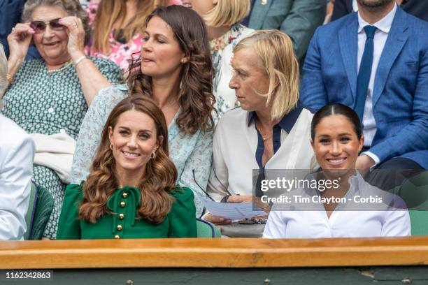 July 13: Catherine, Duchess of Cambridge and Meghan, Duchess of Sussex in the Royal Box on Centre Court during the Serena Williams of the United...
