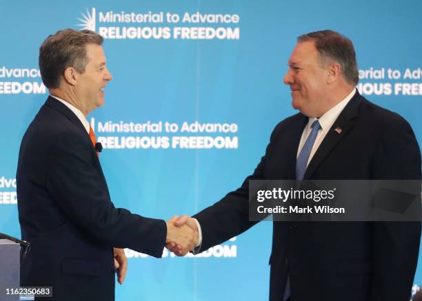 Ambassador at Large for International Religious Freedom, Sam Brownback, introduces U.S. Secretary of State Mike Pompeo to deliver opening remarks at...