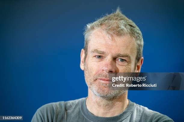 English novelist Mark Haddon attends a photocall during the Edinburgh International Book Festival 2019 on August 18, 2019 in Edinburgh, Scotland.