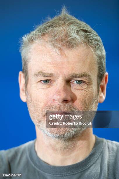 English novelist Mark Haddon attends a photocall during the Edinburgh International Book Festival 2019 on August 18, 2019 in Edinburgh, Scotland.