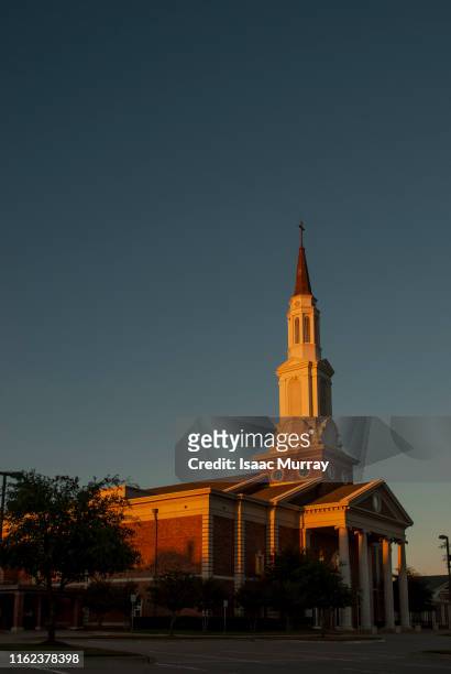 church steeple with beautiful golden light - plano stockfoto's en -beelden