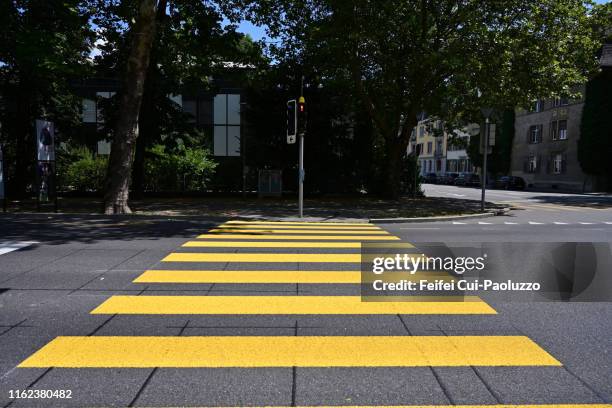 zebra crossing at downtown biel, switzerland - zebra crossing stock-fotos und bilder