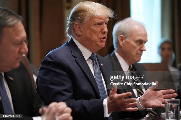 President Donald Trump talks with journalists during a cabinet meeting with Secretary of State Mike Pompeo , acting Defense Secretary Richard Spencer...