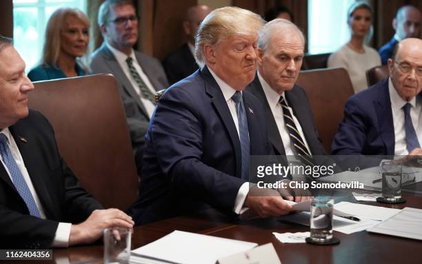 President Donald Trump makes a face while talking about Rep. Ilhan Omar during a cabinet meeting at the White House July 16, 2019 in Washington, DC....