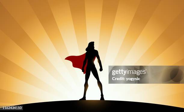 vektor weibliche superhelden silhouette mit sunburst-effekt im hintergrund - superheld stock-grafiken, -clipart, -cartoons und -symbole