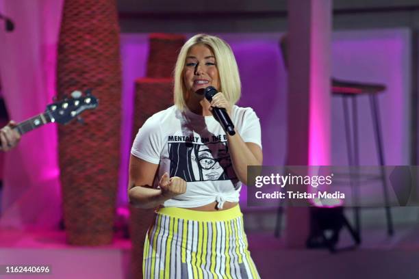 Beatrice Egli during the television show "Willkommen bei Carmen Nebel" at Baden-Arena on July 13, 2019 in Offenburg, Germany.