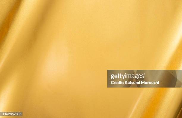 gold texture background - shiny fabric stock pictures, royalty-free photos & images