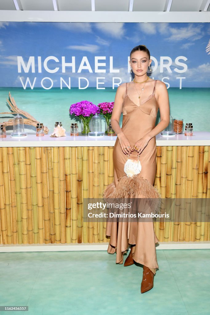 Michael Kors & Gigi Hadid Bring Fantasy Island To NYC For The Launch Of The Latest Wonderlust Fragrance Campaign