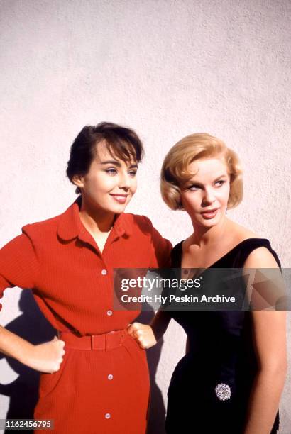 Miss Universe Carol Morris and Miss Sweden Ingrid Goude pose for a portrait on November 7, 1955.