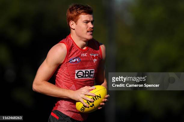 Toby Pink of the Swans runs the ball during a Sydney Swans AFL training session at Lakeside Oval on July 17, 2019 in Sydney, Australia.