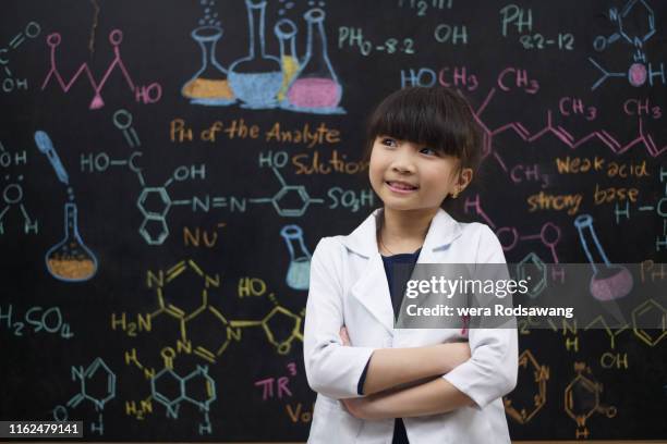 the tiny scientist confident - 科学者　子供 ストックフォトと画像
