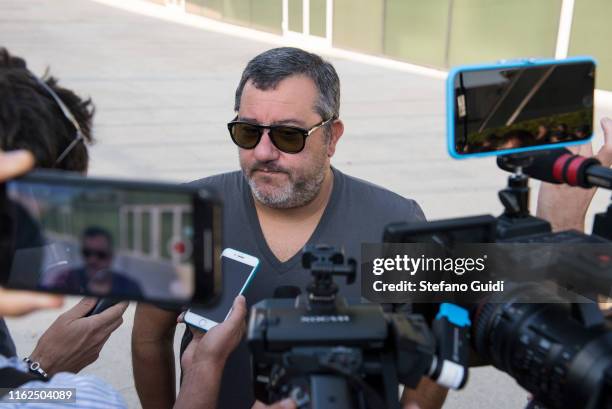 Agent Mino Raiola accompanies Matthijs De Ligt as he arrives in Turin ahead of his signing with Juventus FC on July 17, 2019 in Turin, Italy.