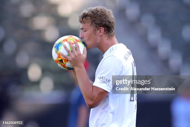Jann-Fiete Arp of FC Bayern Muenchen kisses the match ball during a FC Bayern Muenchen training session at Dignity Health Sports Park on the second...