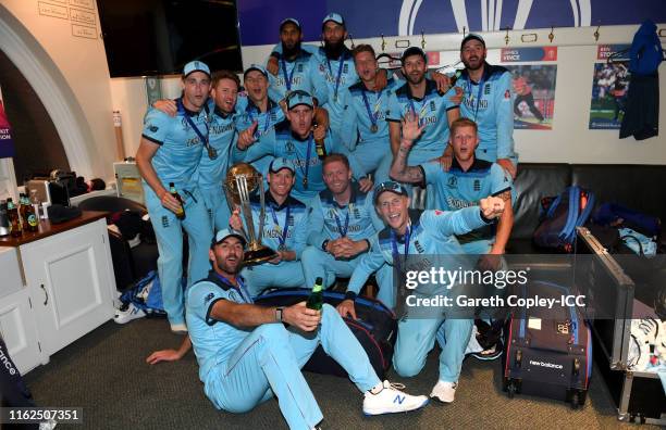 England celebrate in the dressing rooms after winning the Final of the ICC Cricket World Cup 2019 between New Zealand and England at Lord's Cricket...
