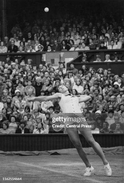 Martina Navratilova of the United States keeps her eye on the ball as she serves to Chris Evert during their Women's Singles Final match at the...