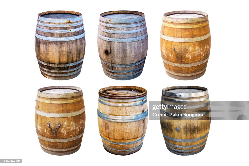Groups old wooden barrel for champagne, wine, whiskey, rum, beer, with steel ring on white background.