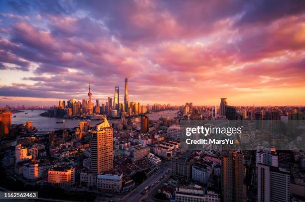 shanghai skyline sunset - sunset city stock pictures, royalty-free photos & images