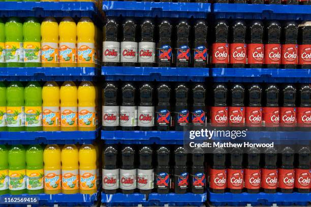 Plastic bottles of fizzy drinks on sale in a supermarket on July 4, 2019 in Cardiff, United Kingdom.