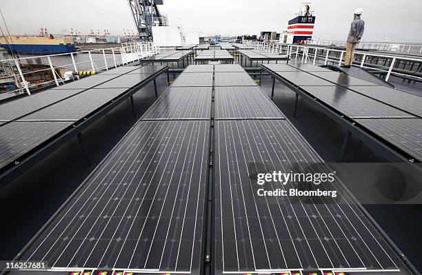 Solar panels sit on the Nippon Yusen K.K.'s car transporter ship, Auriga Leader, at Mitsubishi Heavy Industries Ltd.'s Honmoku plant in Yokohama...