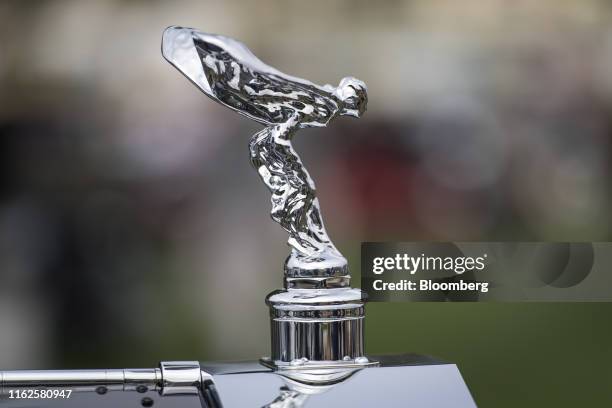 The hood ornament of a 1928 Rolls-Royce Phantom I Brewster Derby Speedster sits on display during the 2019 Pebble Beach Concours d'Elegance in Pebble...
