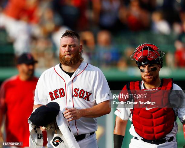 Starting pitcher Andrew Cashner of the Boston Red Sox walks from the bullpen to the dugout before the game against the Toronto Blue Jays at Fenway...