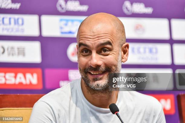 Head coach Pep Guardiola of Manchester City attends a press conference after Premier League Asia Trophy match between West Ham United and Manchester...