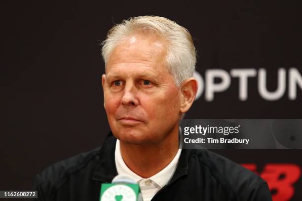 Celtics President of Basketball Operations Danny Ainge reacts during a press conference introducing Kemba Walker , and Enes Kanter at the Auerbach...