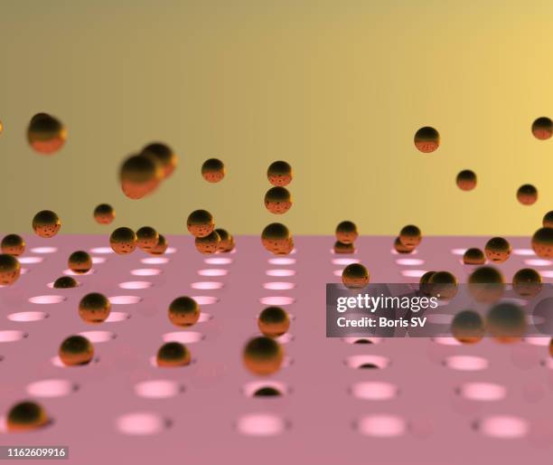 spheres popping from holes - magnetic field stock pictures, royalty-free photos & images