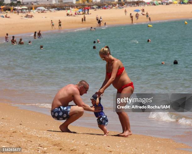 Danielle Lloyd and Jamie O'Hara with baby Archie sighted on holiday in Portugal on June 11, 2011.