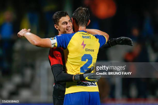 Westerlo's goalkeeper Berke Ozer and Westerlo's Maxime Biset celebrate after a soccer match between KVC Westerlo and KSV Roeselare, Saturday 17...