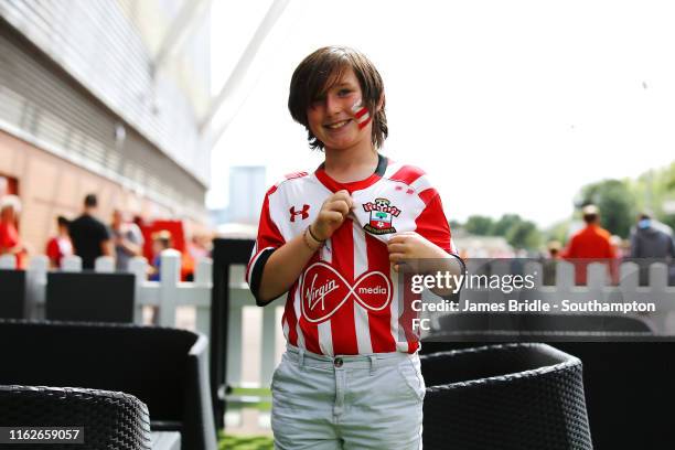 Young Southampton FC fan ahead of the Premier League match between Southampton FC and Liverpool FC at St Mary's Stadium on August 17, 2019 in...