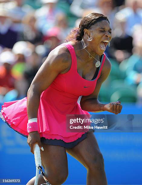 Serena Williams of USA in action against Vera Zvonareva of Russia during day five of the AEGON International at Devonshire Park on June 15, 2011 in...