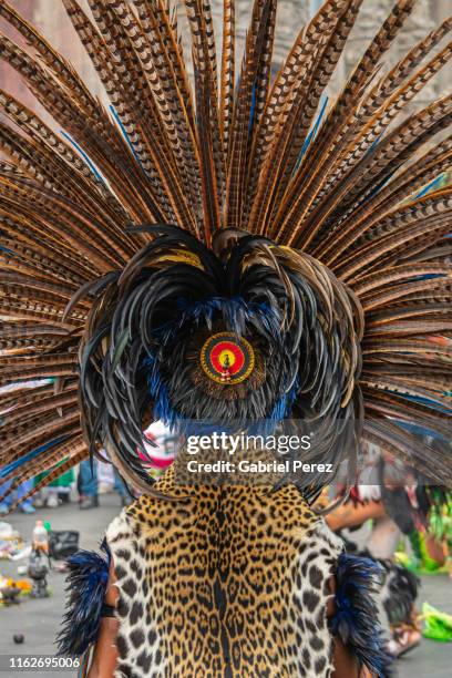 a feathered aztec headdress - aztec headdress stock pictures, royalty-free photos & images