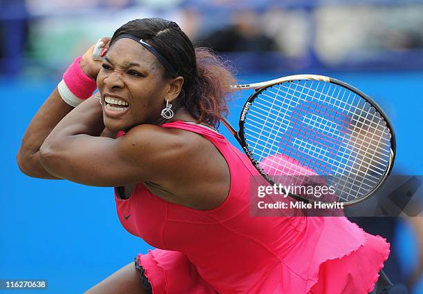 Serena Williams of USA in action against Vera Zvonareva of Russia during day five of the AEGON International at Devonshire Park on June 15, 2011 in...