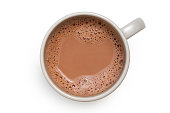 Hot chocolate in a grey ceramic mug isolated on white from above.