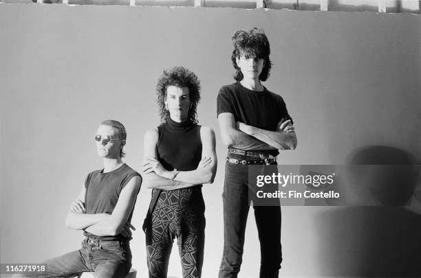 Love and Rockets , British rock band, pose for a group portrait at Rufus Street Studios, on Rufus Street, London, England, Great Britain, in August...