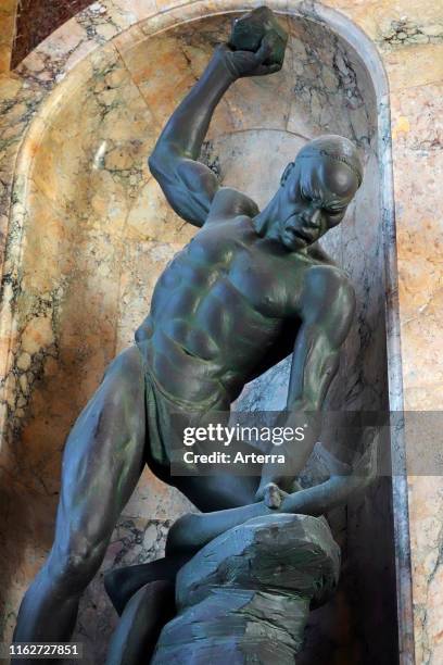 Sculpture Fight with Snake by Belgian sculptor Arthur Dupagne in the AfricaMuseum / Royal Museum for Central Africa, Tervuren, Belgium.