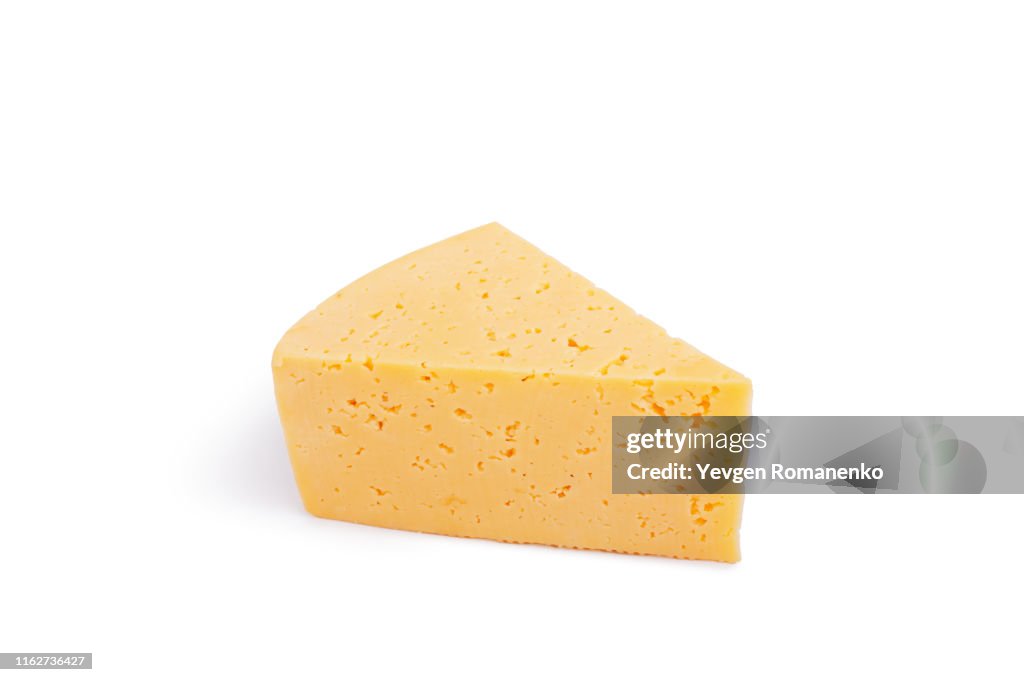 Triangle cheese chunk isolated on white background