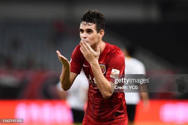 Oscar of Shanghai SIPG celebrates after scoring a goal during the 18th round match of 2019 Chinese Football Association Super League between Shanghai...