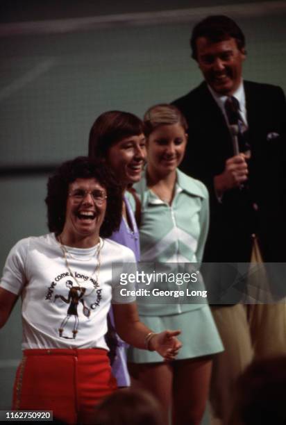 Virginia Slims Championship: USA Billie Jean King, Martina Navratilova, and Chris Evert on court during trophy presentation at Los Angeles Memorial...