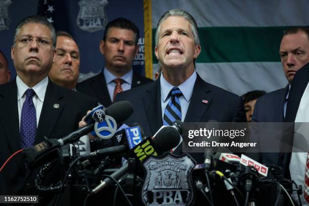 Pat Lynch, president of the NYC Police Benevolent Association, speaks during a press conference after the announcement of the termination of officer...