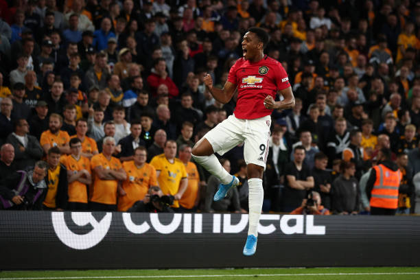 Anthony Martial of Manchester United celebrates scoring the opening goal during the Premier League match between Wolverhampton Wanderers and...
