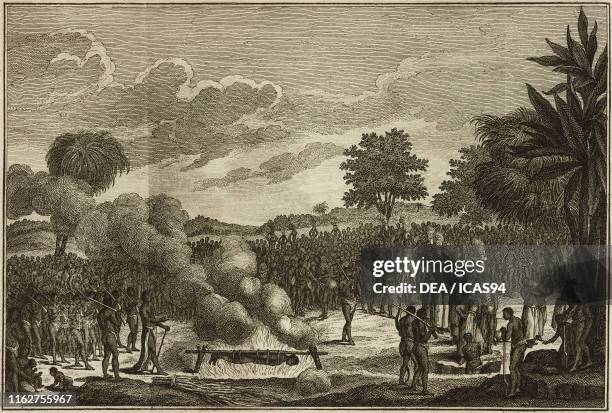 Woman burned alive, punishment for the adulterous wives of the king of Juida and their lovers, Benin, Africa, engraving from Compendio della storia...