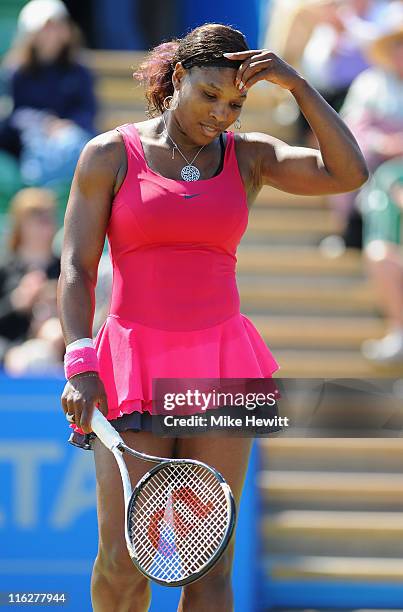 Serena Williams of USA struggles against Vera Zvonareva of Russia during day five of the AEGON International at Devonshire Park on June 15, 2011 in...