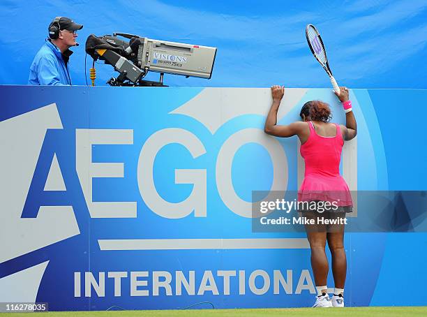 Serena Williams of USA struggles against Vera Zvonareva of Russia during day five of the AEGON International at Devonshire Park on June 15, 2011 in...