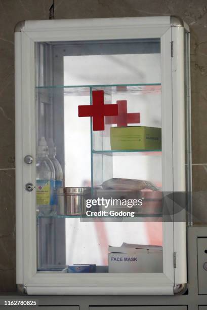 First aid box hanging on the wall. Vung Tau. Vietnam.
