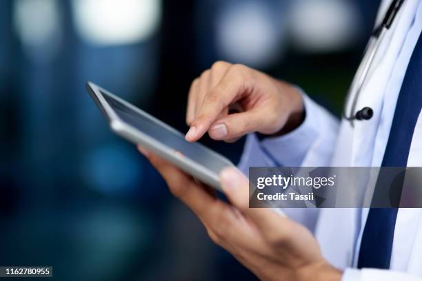 where the modern and medical world meets - zoom in ipad stock pictures, royalty-free photos & images