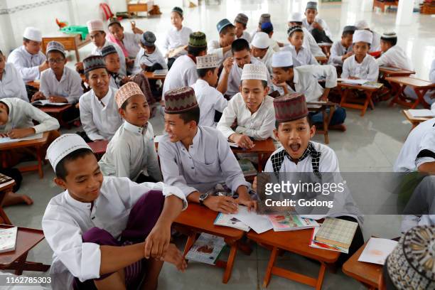 Jamiul Azhar mosque. Muslim children study the Quran at a Madrassa school. Chau Doc. Vietnam.