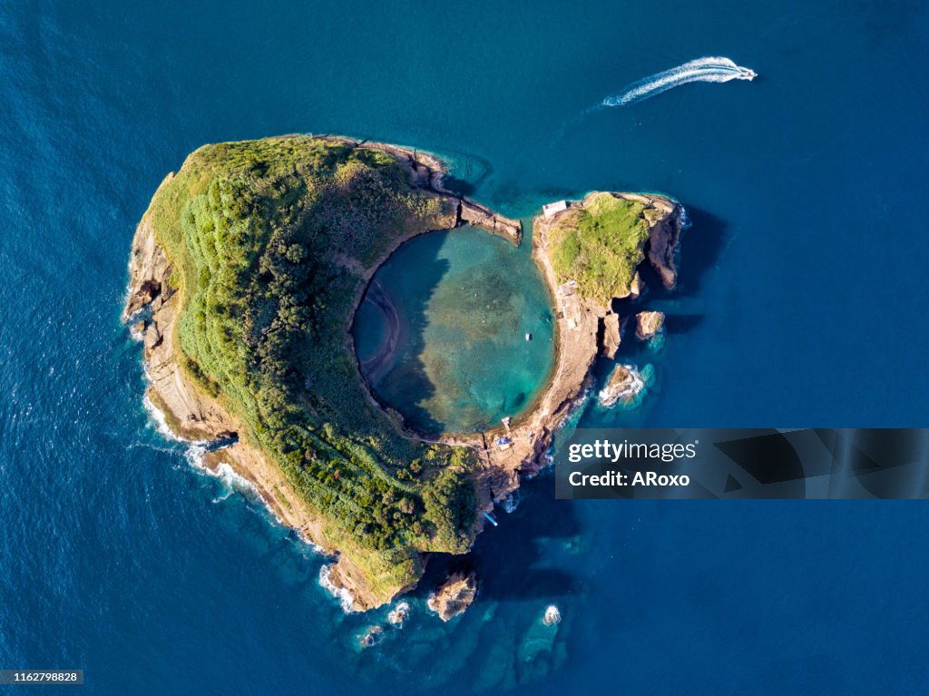 San Miguel island, Azores, Portugal. Top view of Islet of Vila Franca do Campo.  Azores aerial panoramic view. Crater of an old underwater volcano. Bird eye view.
